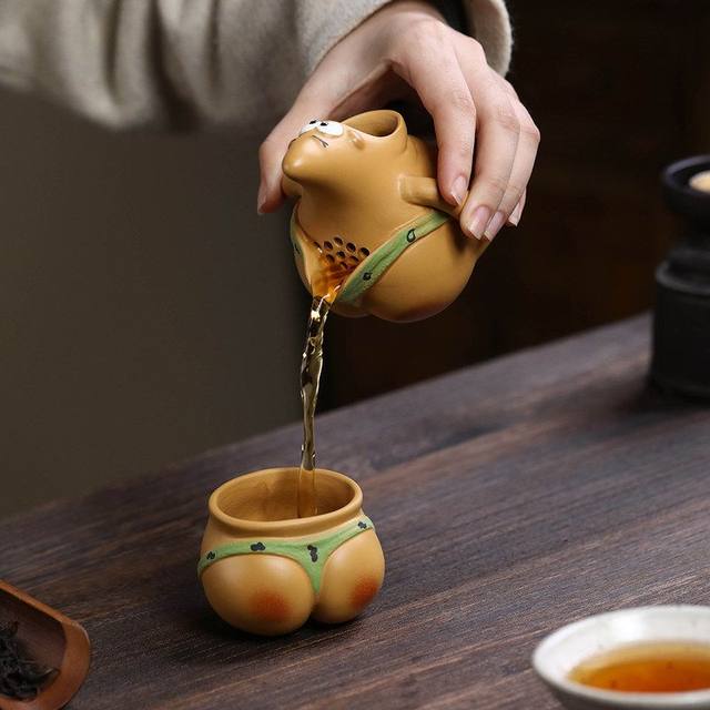 Handmade purple sand pot, fun and creative, big star hand-held pot, fair cup, butt cup, teapot, quick cup tea set