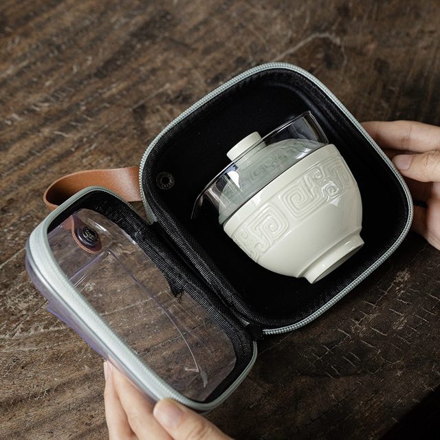 Imitation Song Dynasty Ding kiln white Taotie pattern quick cup hand-held pot tea cup set outdoor portable travel tea set for one person to drink