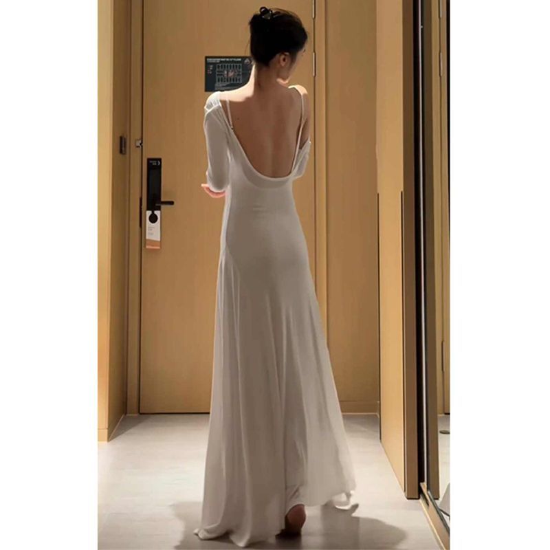 Vacation Beach Dress with a High-End Feel, Waist-Cinching and Slimming Effect, White Long-Sleeve Backless Dress for Women, New Spring 2025 Collection