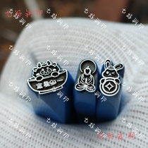 A bowl of rich formless Buddha hand-knocked steel stamps gold and silver jewelry chisel carvings flower tools molds steel punching stamps