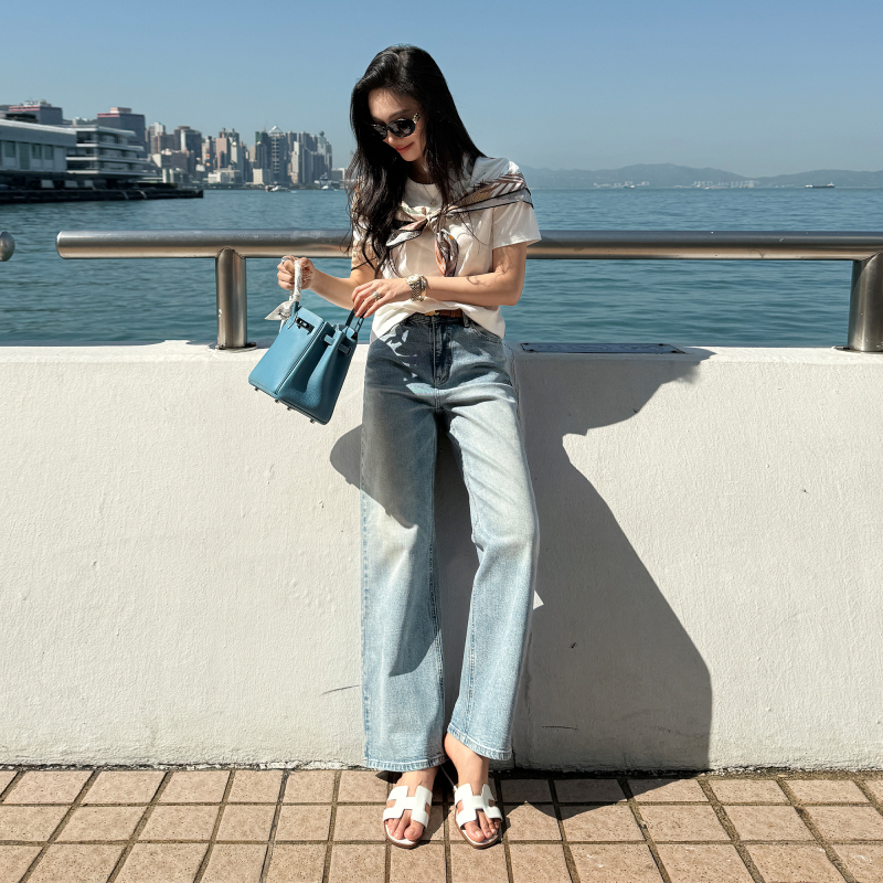 Empress W "Classic Light Blue Denim Jeans with Vintage Washed Straight Leg Cut, Made with Italian Imported Material and Distressed Finish Empress W "Classic Light Blue Denim Jeans with Vintage Washed Straight Leg Cut, Made with Italian Imported Material and Distressed Finish