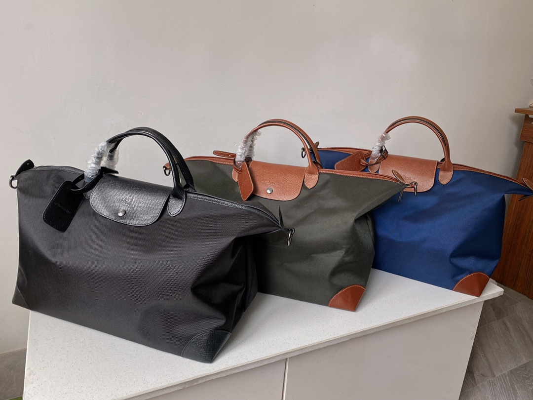 2025年新作高品質大容量旅行バッグ生地ハンドバッグビジネス旅行大型ハンドバッグ斜め掛けショルダー