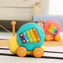 Toy small snail toddler educational leash multi-functional baby carriage ejection toy drag and knock piano infant snail