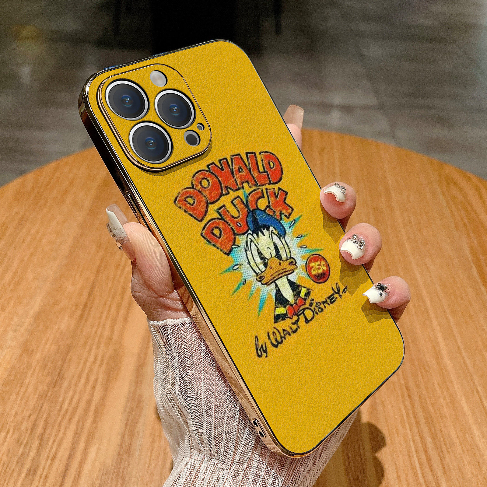 适用苹果17promax手机壳iphone16/15/12/13/14软壳潮流黄色底唐老鸭英文电镀金边皮质高档全包高级感防摔套潮评价- 淘宝网