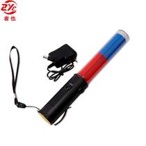 The traffic baton is also a rechargeable nighttime fluorescent signal stick a hand-held red and blue flashing warning stick LED photo