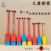 People rowing big boats props oars planks childrens dragon boat races mens dance boats performances paddle races stage