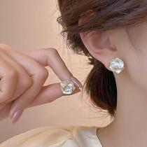 Light luxury simple and high-end niche camellia earrings for women ins fashion internet celebrity the same cool style earrings