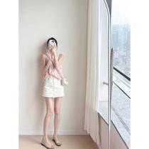 Pink heavy-duty splicing vest sleeveless loose A-line shirt top Slim-fitting beige jeans skirt suit