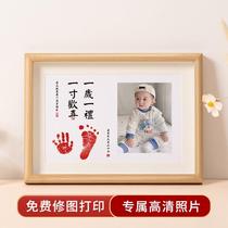 Hand and foot prints of a family of four photo frame of hand and foot prints of a family of three 100th anniversary hand and foot prints ceremony of brotherly love