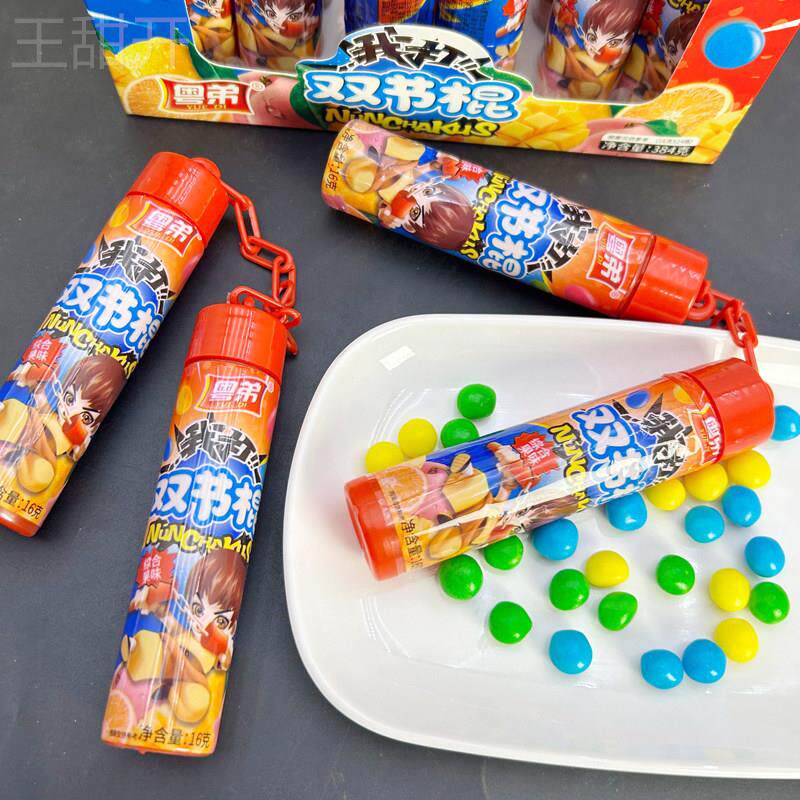 子供向けのクリエイティブなキャンディおもちゃ、楽しいヌンチャク型のカラフルな丸いキャンディ、子供や学生向けのおやつ