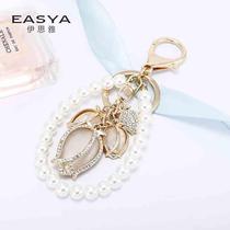Japanese and Korean fashion new cats eye tulip metal keychain exquisite small gift pearl pendant backpack pendant