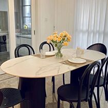 Modern simple black oval dining table for home small apartment restaurant light luxury Internet celebrity style cream style slate dining table