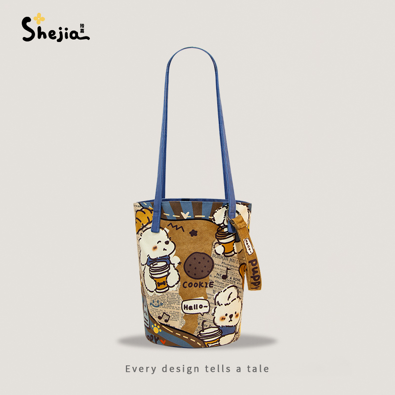 Shijia X Milk Tea Drinking Dog Pattern Niche Design Fashion 2025 New Bucket Bag Commuter Shoulder Crossbody Bag
