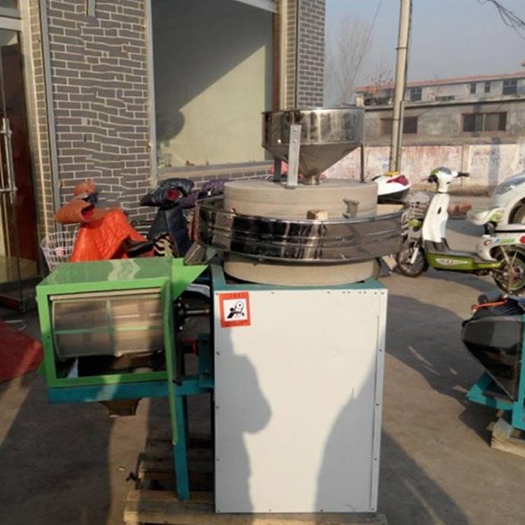 New type of wheat and cereal flour mill electric stone mill. Grain and cereal flour stone mill.