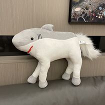 Shark riding horse or whatever it is called you decide. Plush toys for babies.