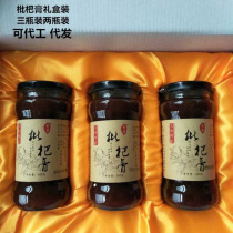 Loquat paste in a drop-shipping gift box. Traditional nourishing delicacy. Hand-made pulp loquat paste.