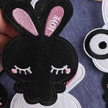 Direct selling new strawberry computer embroidery logo cartoon animal black and white rabbit clothing accessories children's clothing accessories patch stickers