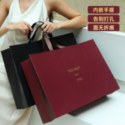 High-grade white cardboard Satchel clothing store shopping packaging paper bag clothes bag packaging gift paper custom wholesale