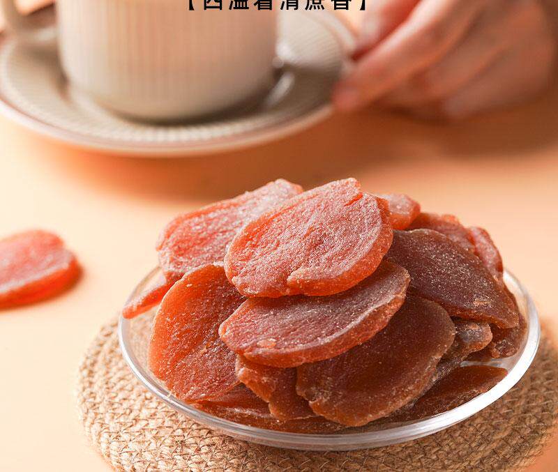 Chen Pi Zi Su Ginger Slices with Tangerine Peel and Perilla Ready to Eat Herbal Snack Candied Ginger in use
