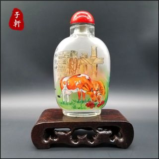 Purely handmade inside-painted snuff bottle and inside-painted bottle. intangible cultural heritage painting with characteristic ethnic style ornaments. zixuan bottle painting art.
