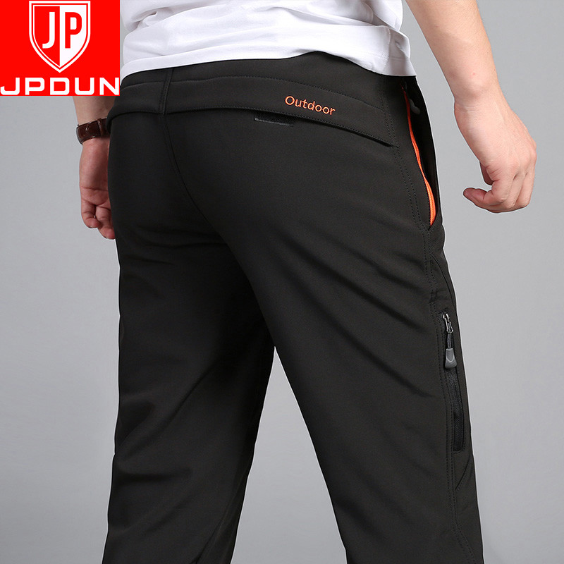 Large size men's soft shell mountaineering sports waterproof outdoor punching pants for men's spring and autumn loose casual long pants