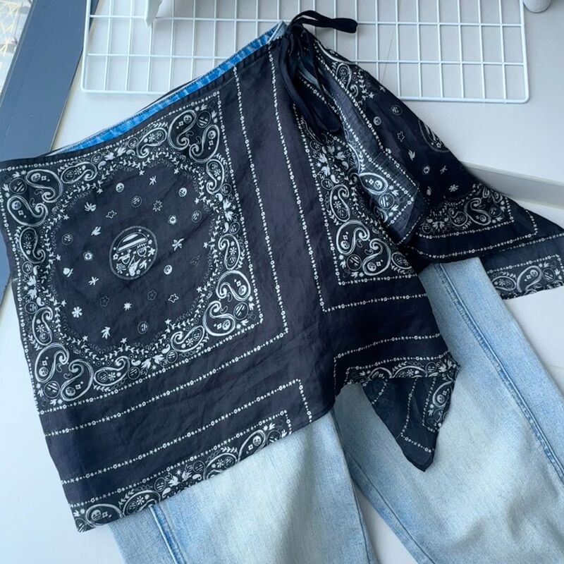 Summer Layering Essential: Printed Side-Tie One-Piece Overlay Skirt with a Draping Effect Summer Layering Essential: Printed Side-Tie One-Piece Overlay Skirt with a Draping Effect