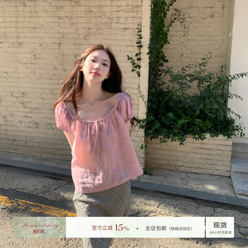 For Jie Shijie, the "Cloud Holiday" Tencel Ramie Lace-Up Elastic Puff Sleeve Top Creates a Lazy Vacation Vibe