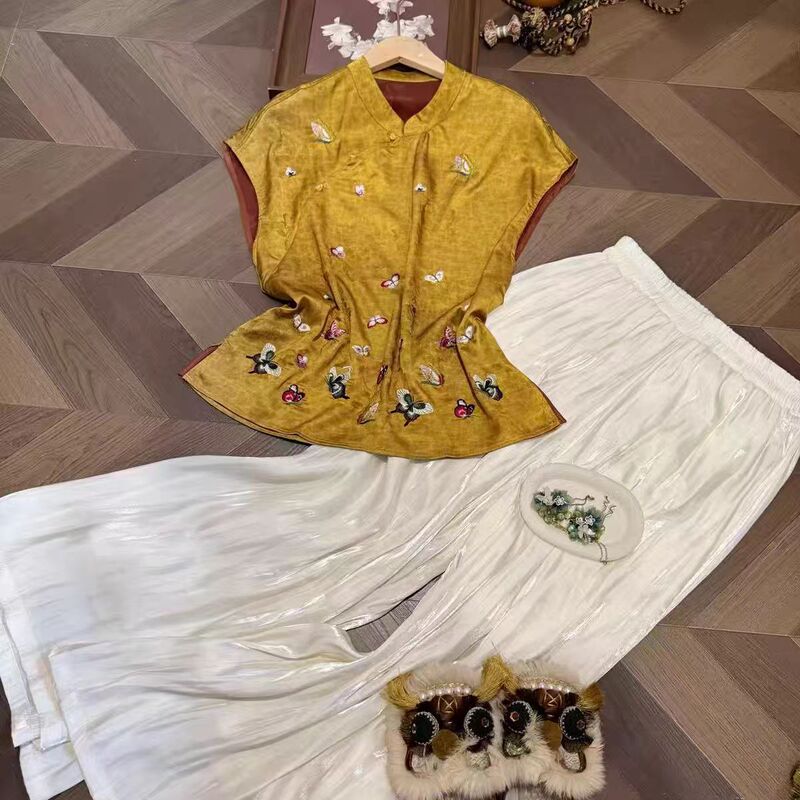 Embroidered Sleeveless Top with Green Butterfly Design