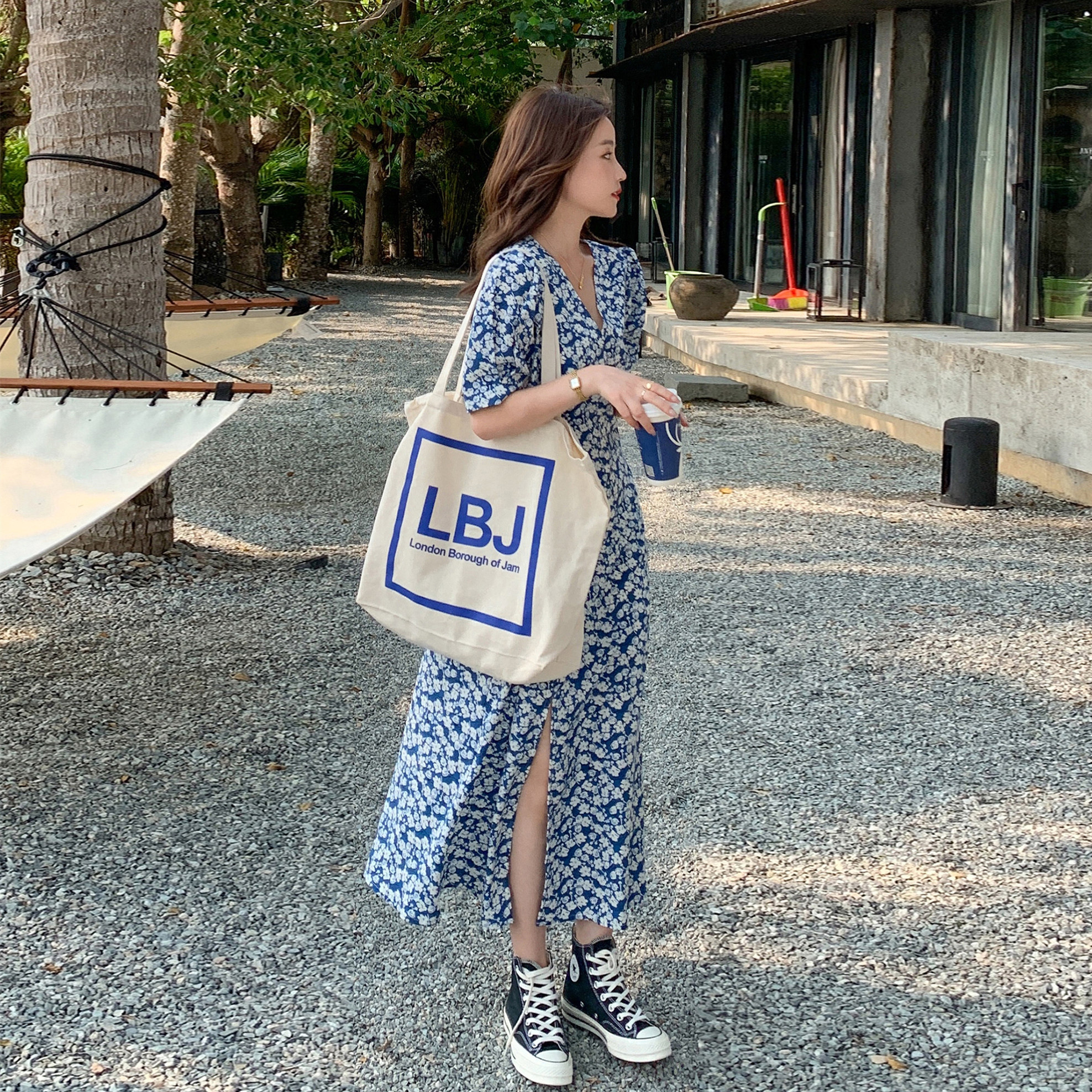 Dress women's thin 2022 summer new model waist thin French high-end temperament floral split long skirt