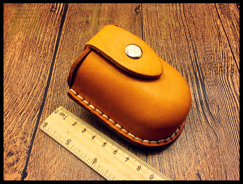 Win the World Thickened Head Layer Yellow Bull Leather Oval Slingshot Steel Ball Bag pocket to send magnetic ring manufacturer Direct Sale