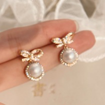 Pearl Girl bow-knot Pearl mosquito coil ear clip earrings without earrings exquisite commuting autumn and winter earrings