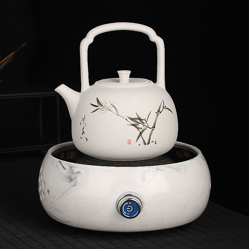 Hand-painted white clay pot boiling teapot black crystal stove pottery tea set kung fu tea set kung fu tea set ceramic kettle Health cooking kettle