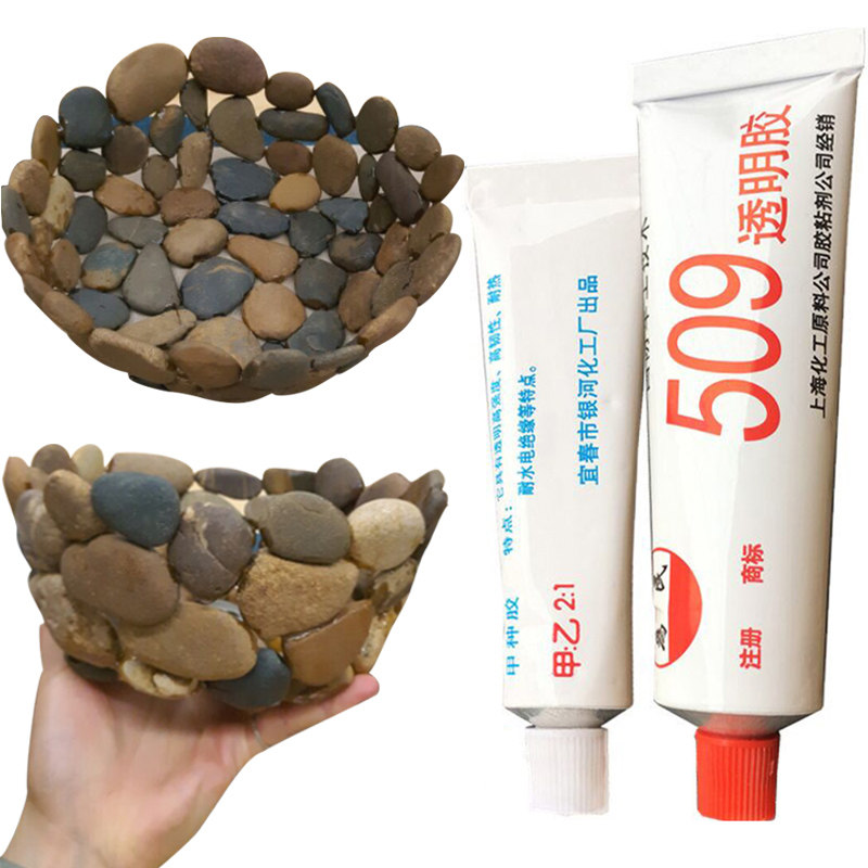 Transparent powerful fish tank made of stick with fake mountain stone head made of green dragon marble material waterproof special glue