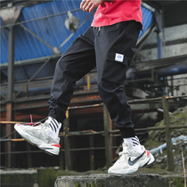 Mens tooling pants men Korean version of the trend cotton casual pants mens fashion brand autumn small feet sports pants tie pants men