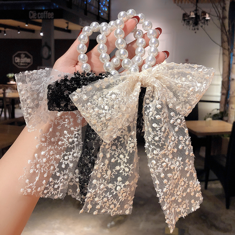 Hot Selling Fashion Pearl Bow Knot Hair Scrunchies display picture 8