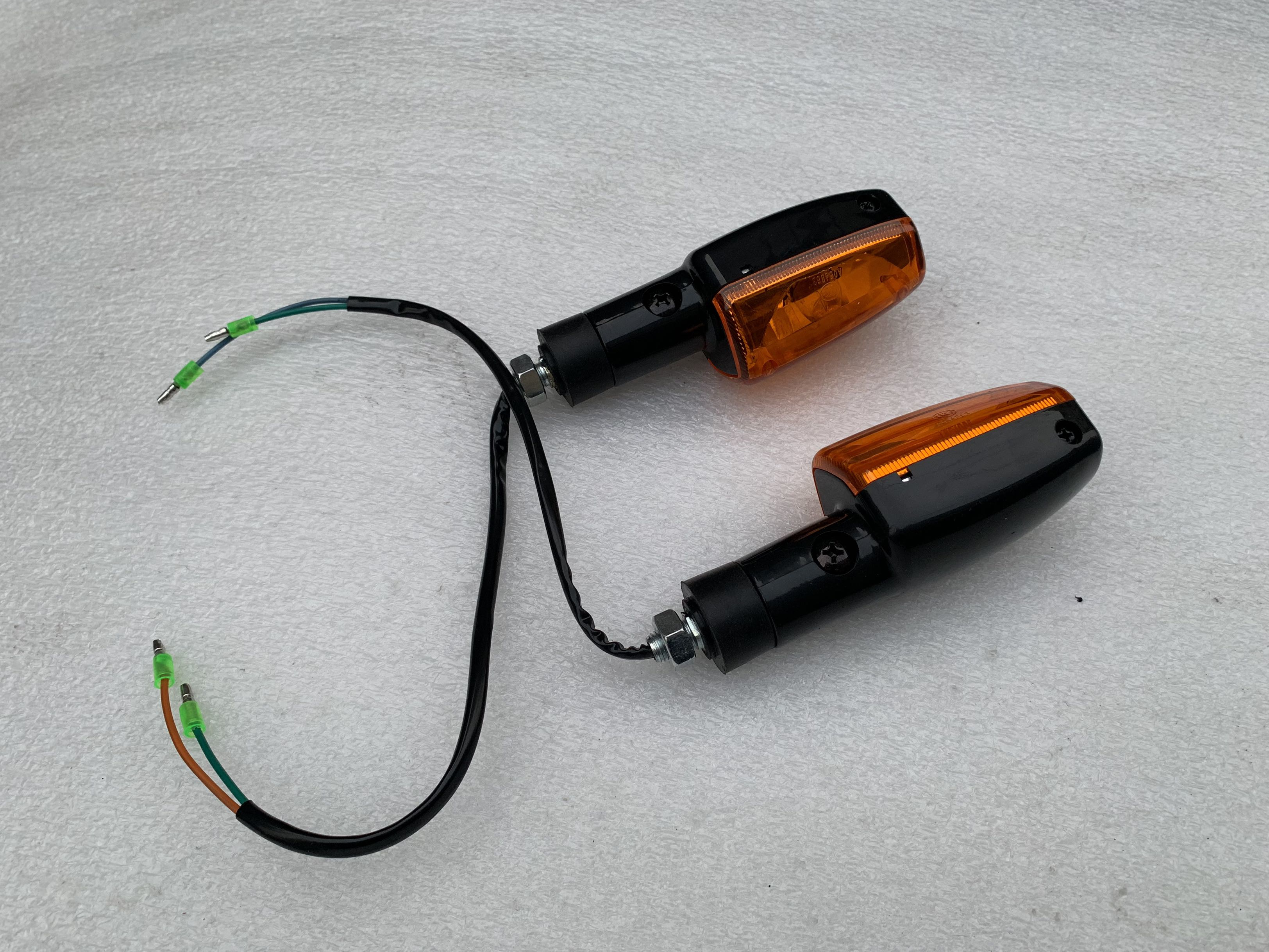 Áp dụng cho phụ kiện xe máy Wuyang Honda Cánh trước WH125-B Fengxiang WH125-N M đèn báo rẽ khóa xe máy