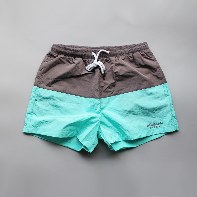 Fashion color matching men's beach pants loose swimming trunks summer seaside vacation sports casual shorts quick-drying three-pointer pants