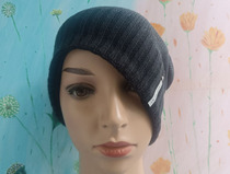 1021-5 Didi Didijia black woven flower label knitted hat autumn and winter cold hat-single top