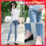 Bà bầu quần jeans xuân hè 2019 mới mặc quần thời trang nâng bụng khoét chân bó sát quần bà bầu - Phụ nữ mang thai quần / quần bụng quần bầu thời trang