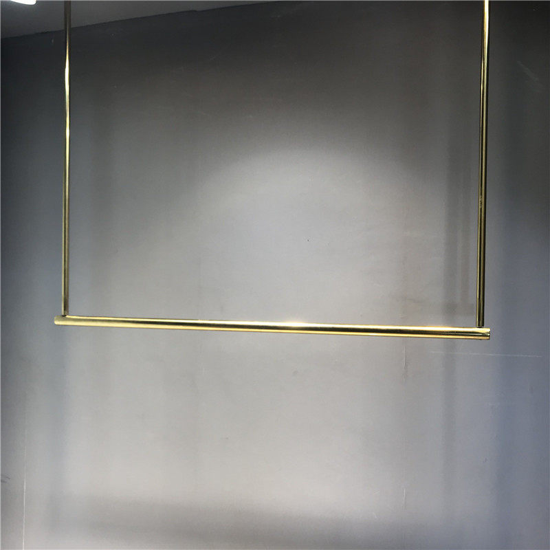 Clothing Store Show Shelves YELLOW TITANIUM ALLOY UPPER WALL CLOTHING RACK ROUND PIPE STAINLESS STEEL HANGING HANGING CHILDREN'S CLOTHING DISPLAY RACK