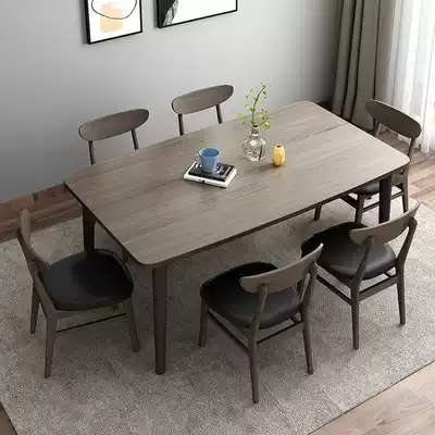 Nordic dining table and chair combination household small apartment modern simple solid wood table legs one table four chairs rectangular dining table