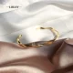 A6 nhắm mắt tinh tế ánh sáng sang trọng zircon vòng đeo tay vàng 18k nữ Nhật Bản và Hàn Quốc hoang dã phong cách Pháp vòng đeo tay điều chỉnh cao cấp - Vòng đeo tay Cuff vòng huyết long