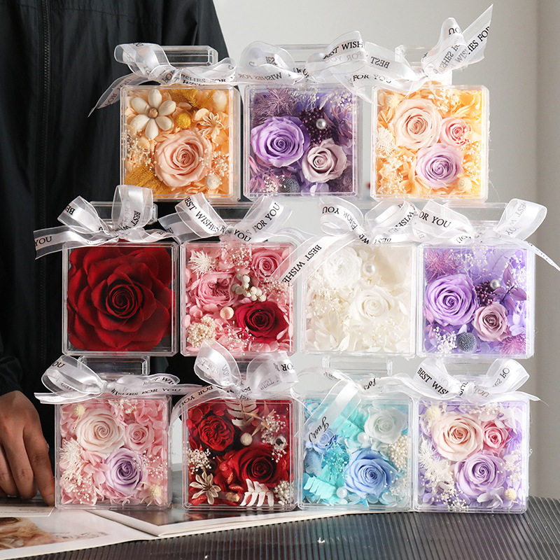 Preserved rose gift boxes in clear acrylic display cases
