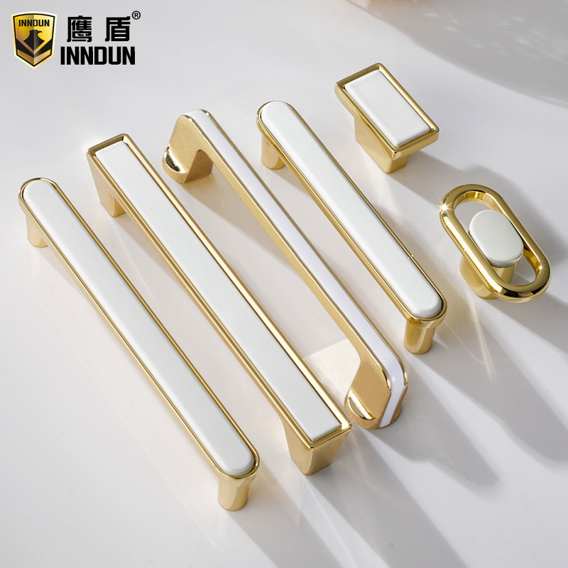 Eagle shield light luxury golden wardrobe door handle Modern simple cabinet cabinet handle Nordic high-end drawer single hole small
