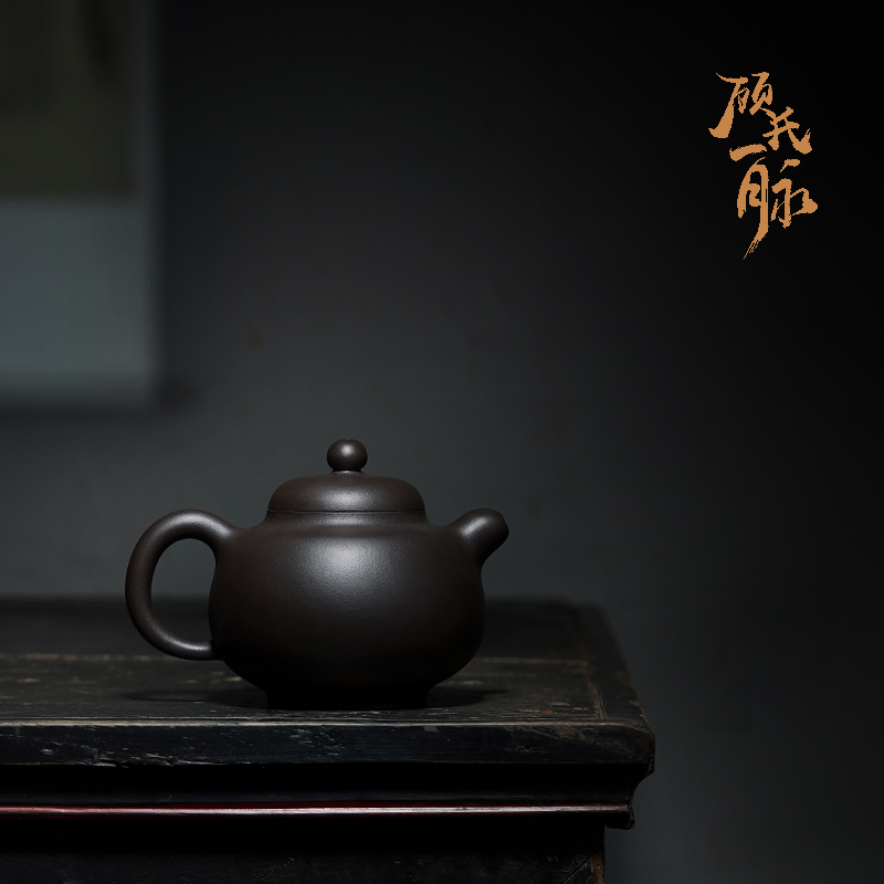 Gu's line Yixing purple clay pot is a master Gu Ting's pure handmade genuine raw ore black mud jade pot