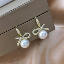 Korea S925 silver pin bow pearl earrings 2021 New Tide temperament advanced sense ear stud girl earrings