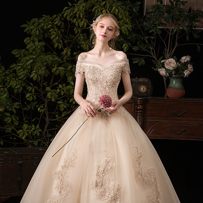 Main wedding dress 2021 new bride forest department dream starry sky super fairy quality pregnant woman wedding dress one shoulder champagne color