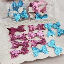 3207 A pack of about 20 sequined bows