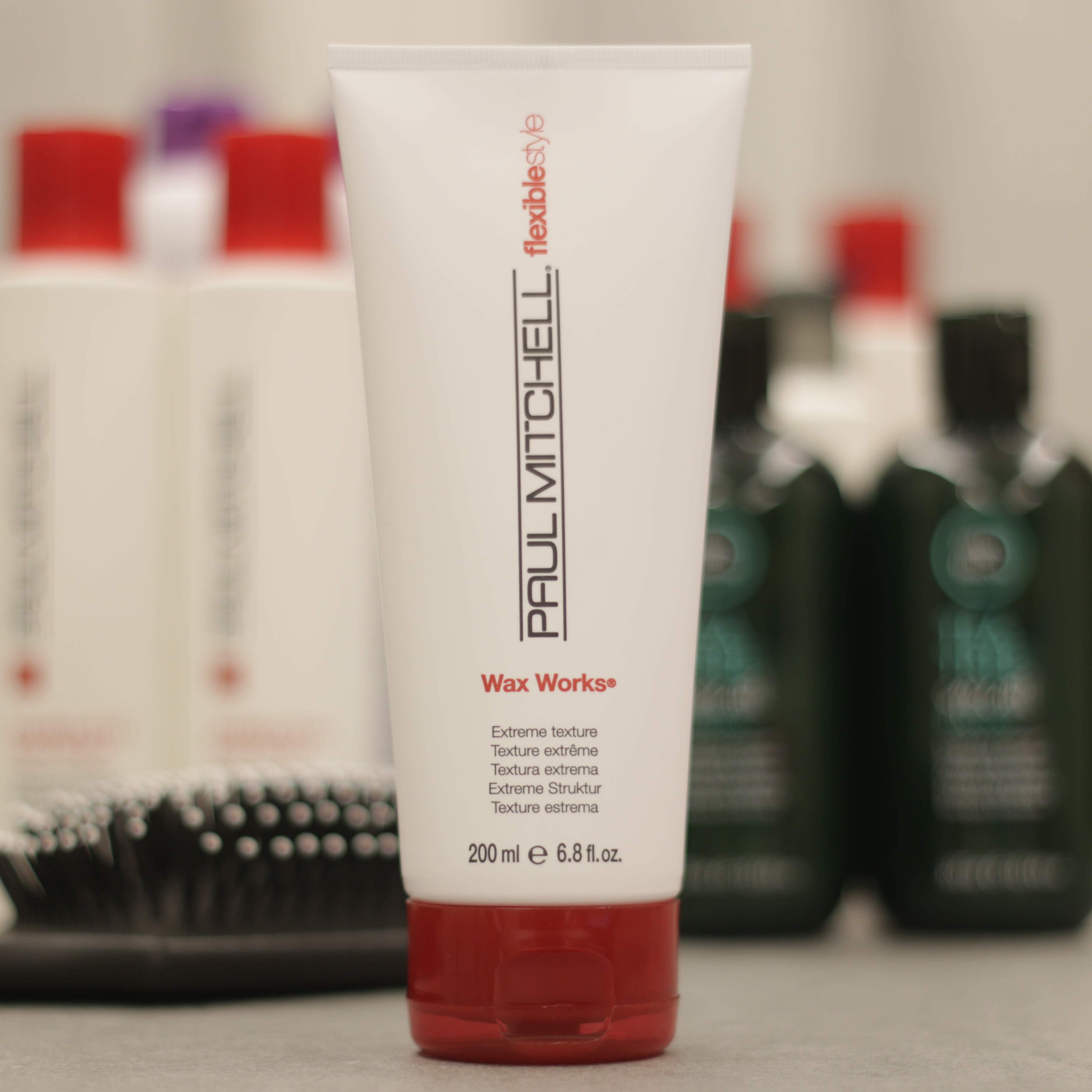 Spot Paul Mitchell Red Cover Milky White Wax smoothes frizzy clothes and splices broken hair