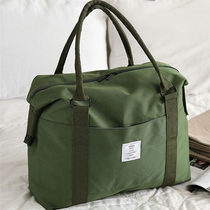 Waterproof travel bag portable luggage bag shoulder short distance canvas travel bag female large capacity waiting bag storage bag